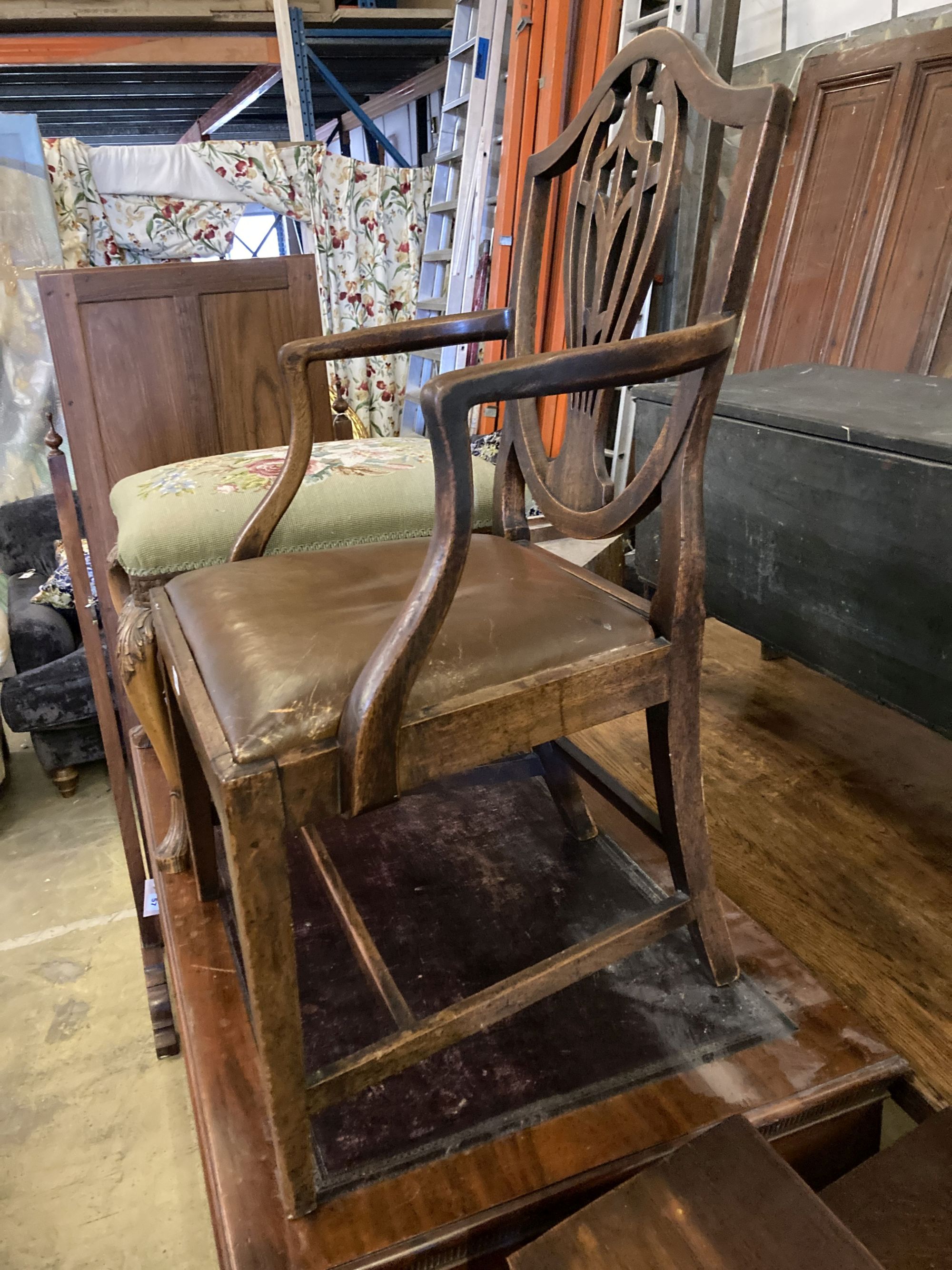 A George III mahogany elbow chair